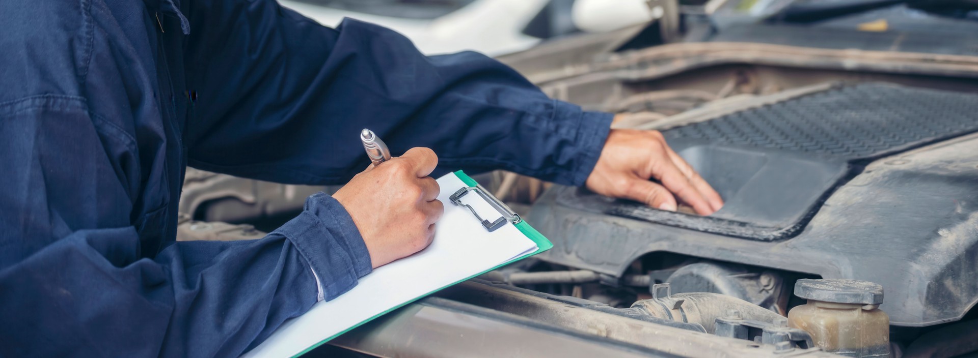 Banner Man hands fixing Car machinery vehicle mechanical service. Mechanic man hands repairing car shop. Panorama open vehicle hood checking up auto mobile. Car maintenance engineer with copy sapce